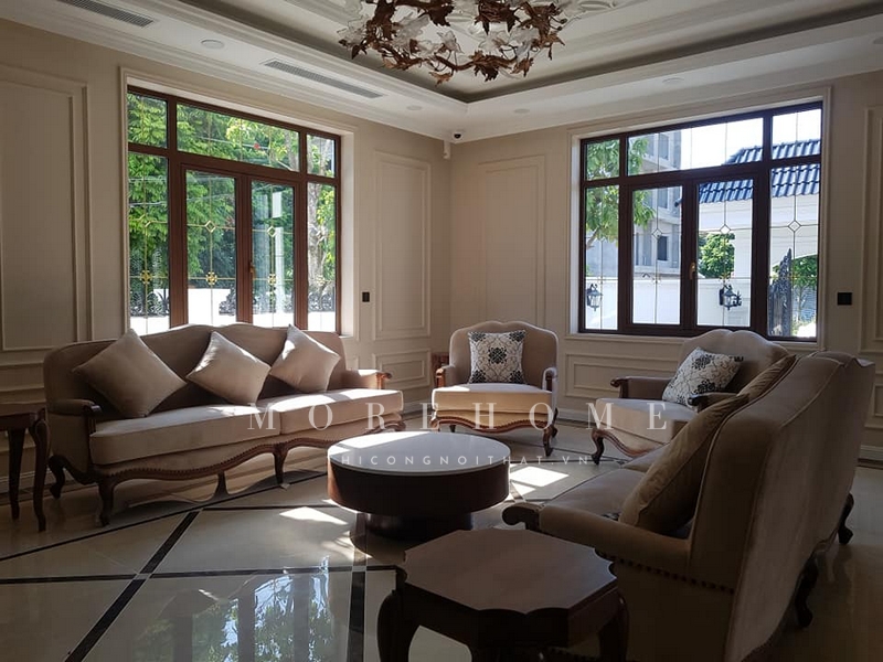 Việc thi công bàn trà tròn gỗ óc chó mặt đá không chỉ làm bàn uống nước mà còn là một phần trang trí nội thất cho không gian.